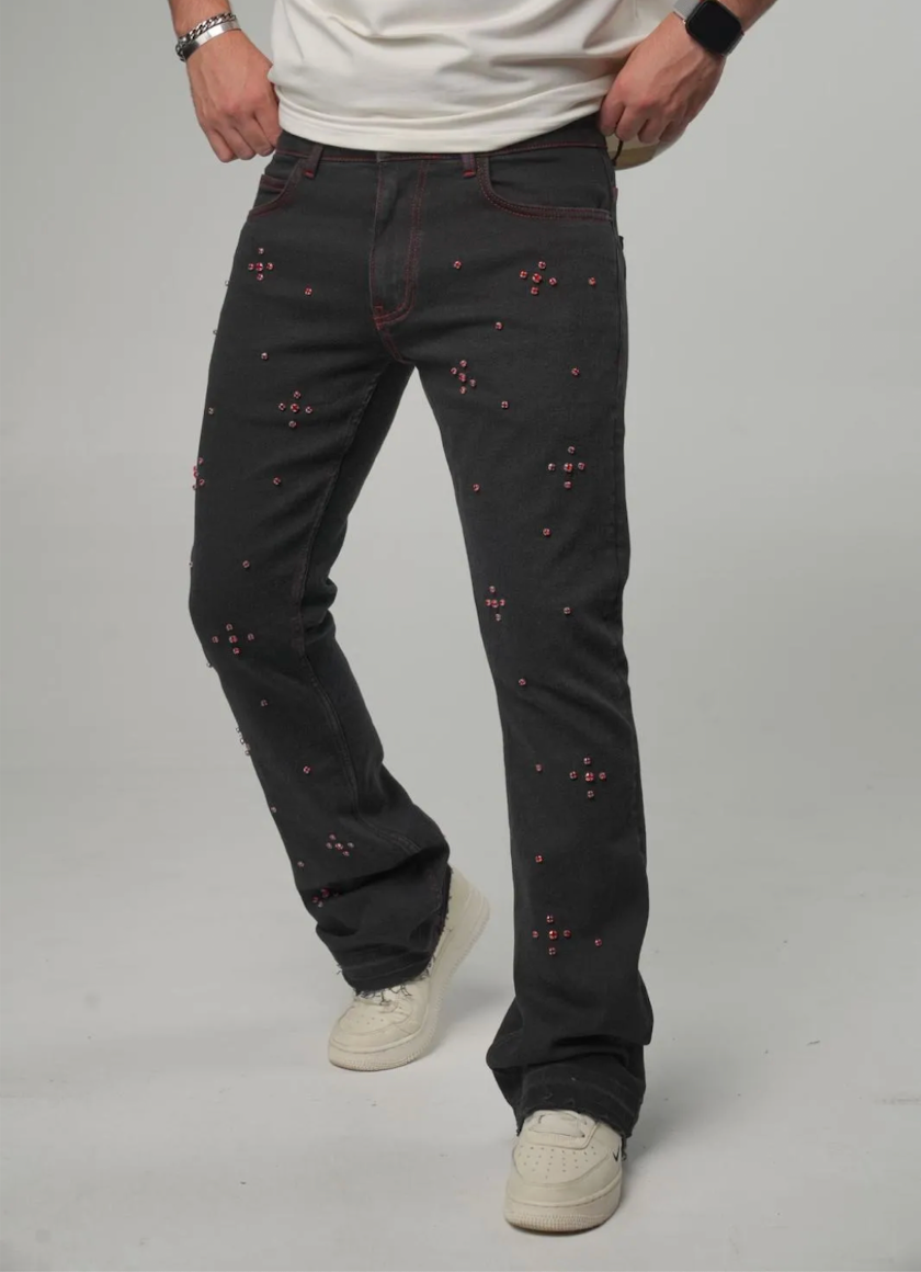JEAN NOIR À CLOUS ROUGES