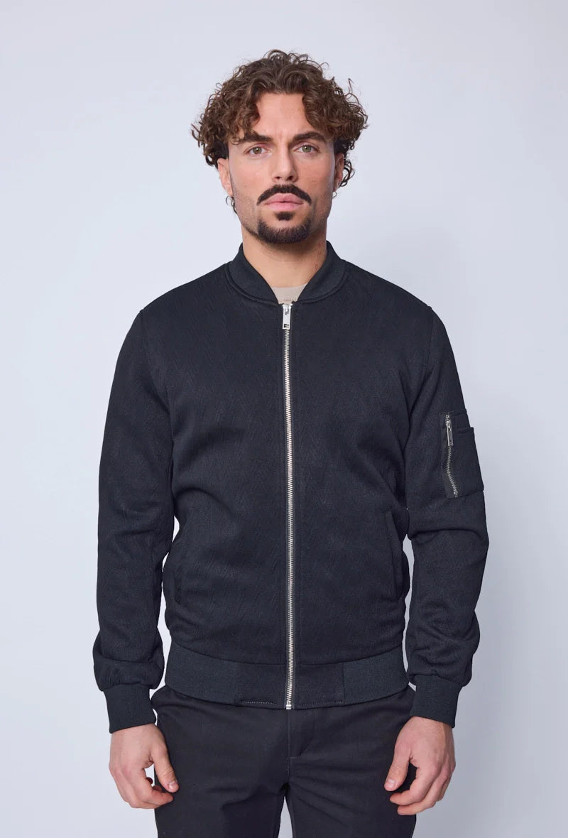 Bomber zippé à motifs en relief