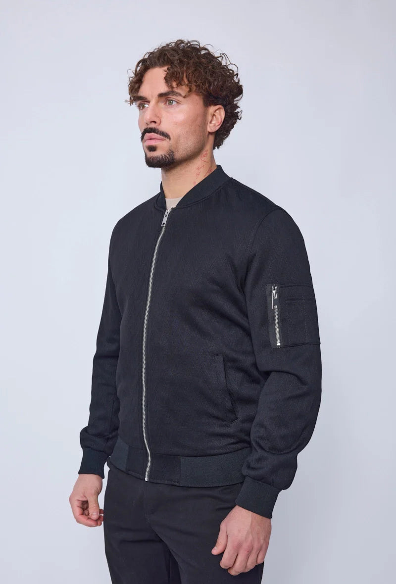 Bomber zippé à motifs en relief